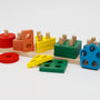 Wooden shape sorter toy with colorful blocks